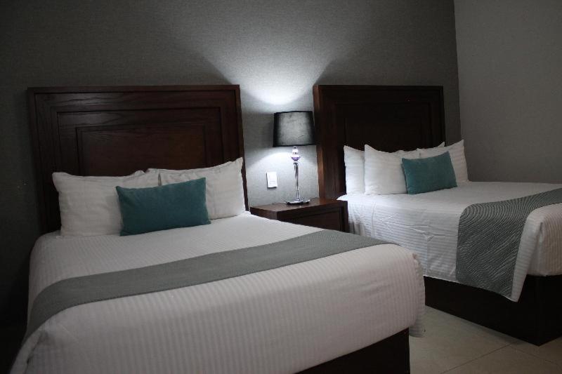 Hotel Suites Mexico Plaza Campestre León Camera foto